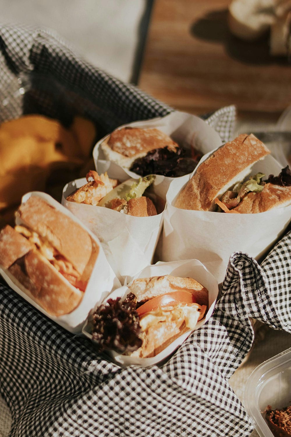 sandwiches wrapped for outdoor picnic