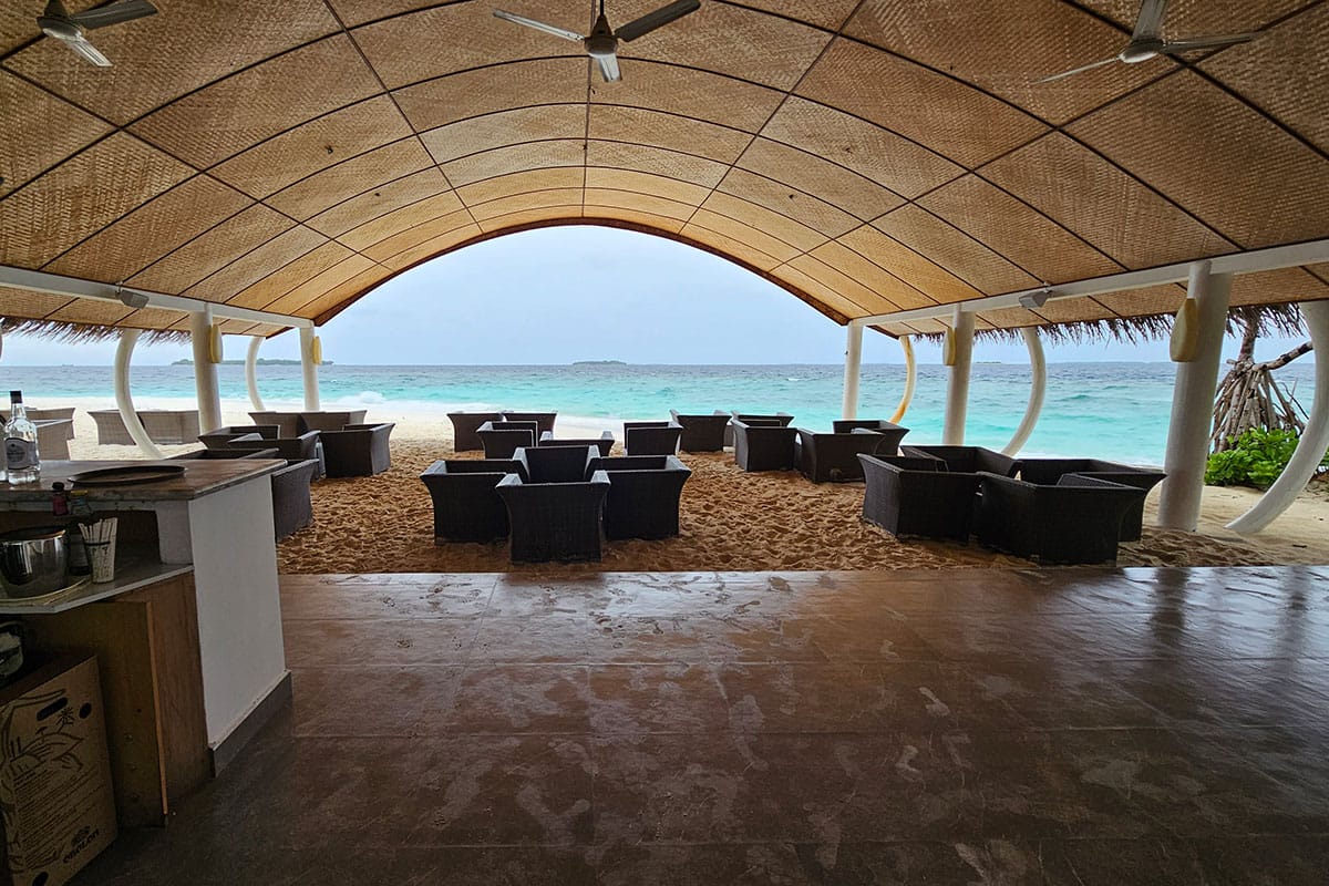 empty beach bar on a resort island in the Maldives on a rainy day