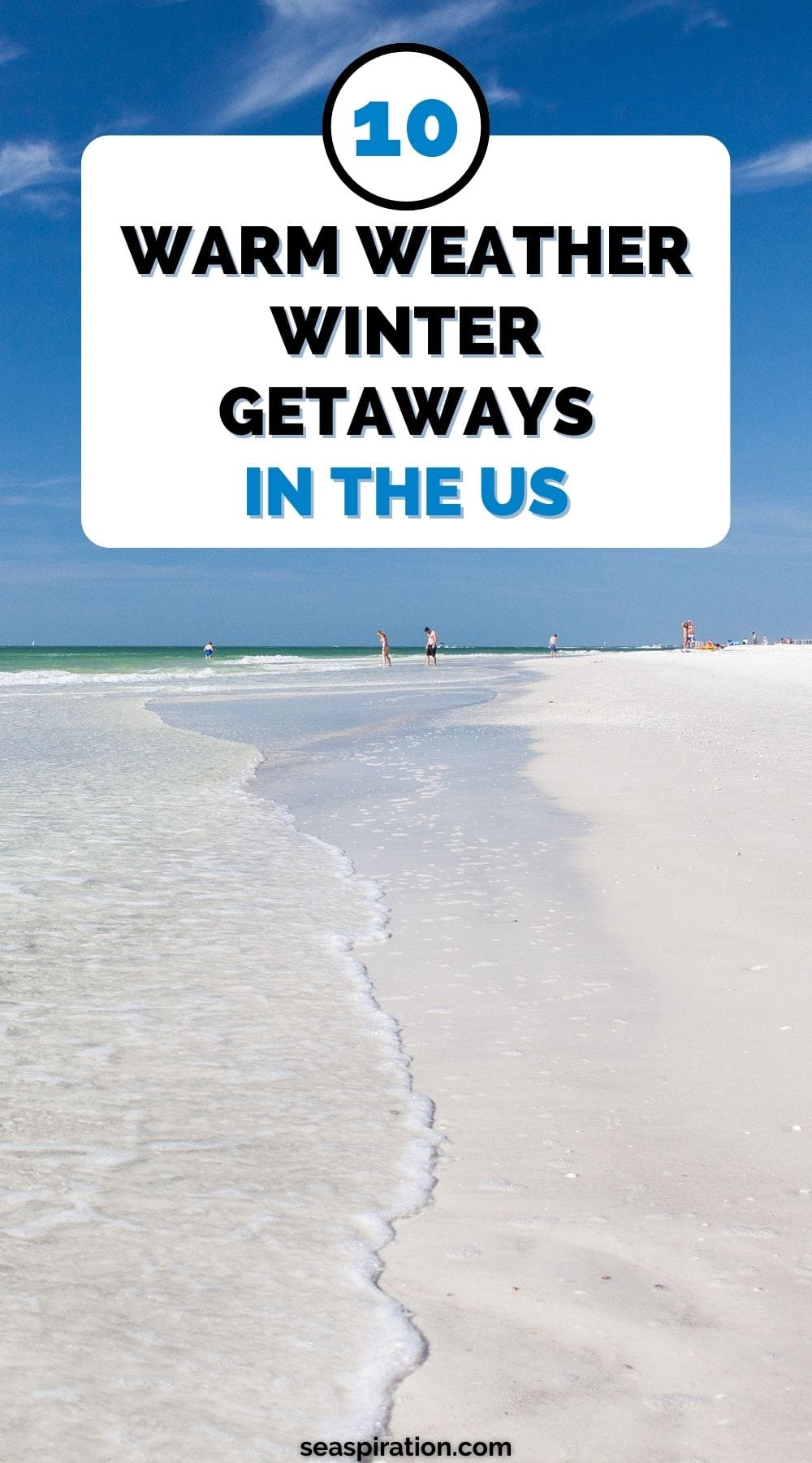 people wading in the sea on a white sandy beach in the USA
