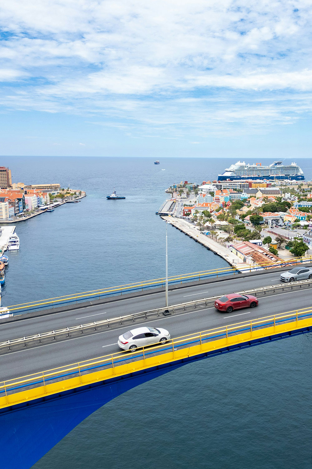 Aerial view of Willemstad, Curaçao with cruise ship docking in the background
