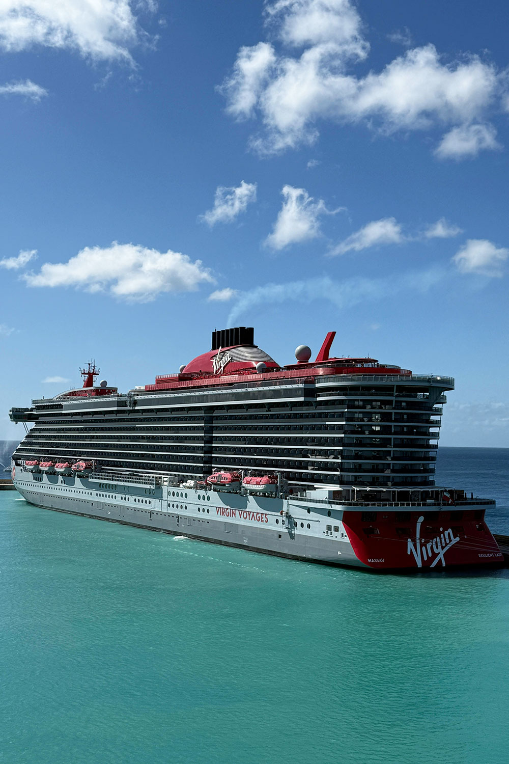 Virgin Voyages Resilient Lady ship docked in port