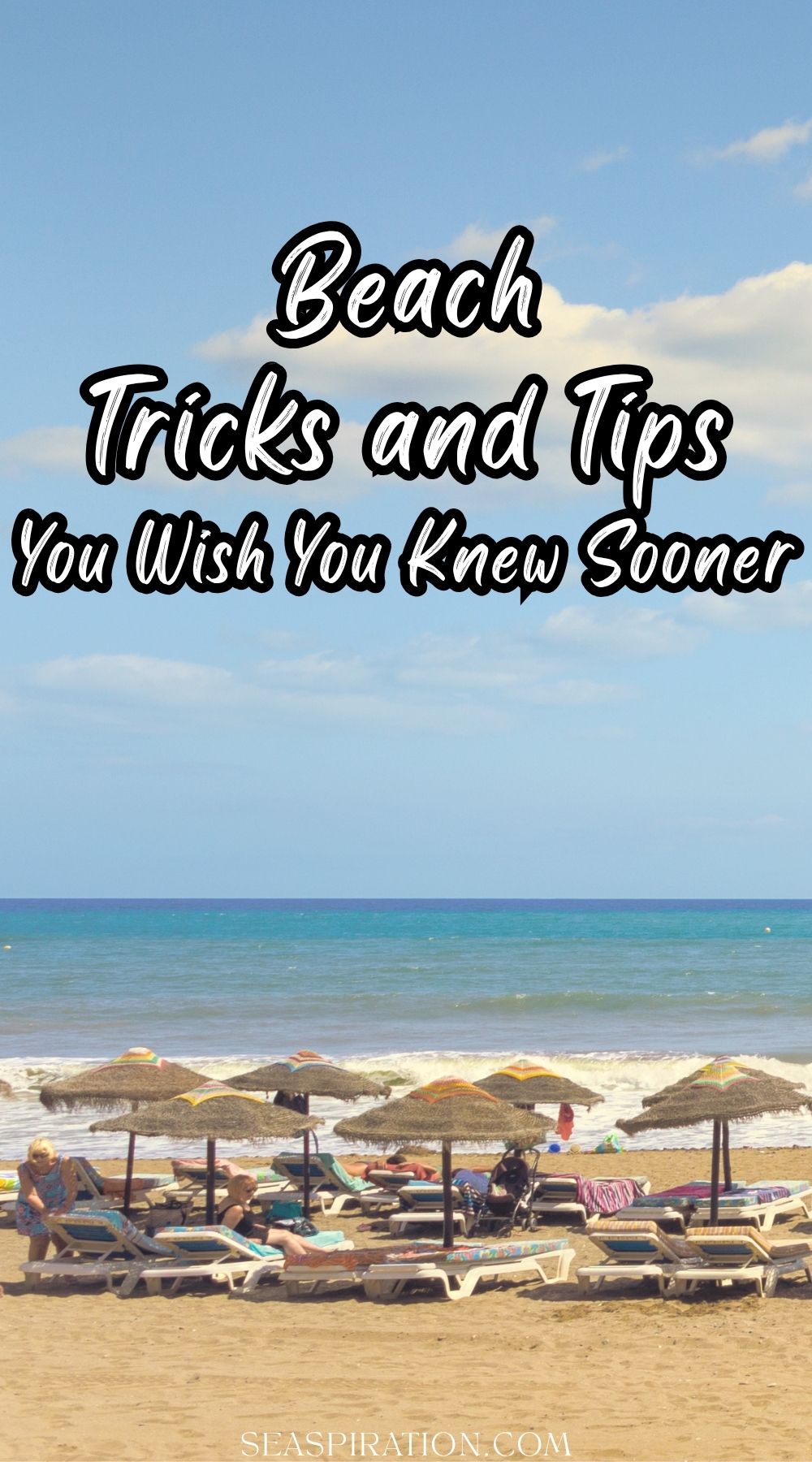 people resting on sunbeds near the water under parasols on a sunny day