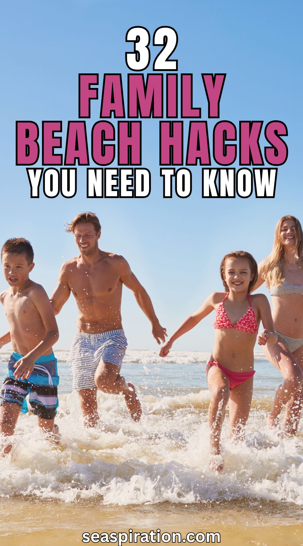 family of 4 running out the sea towards the camera