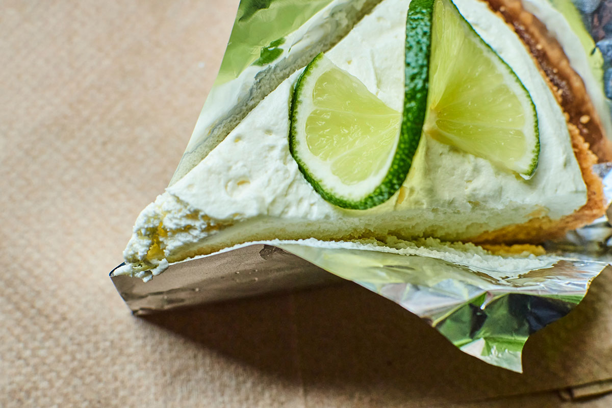 slice of key lime pie wrapped in aluminum foil